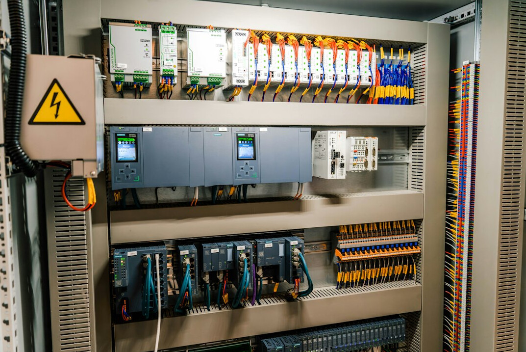 Rows of server racks in a modern data center