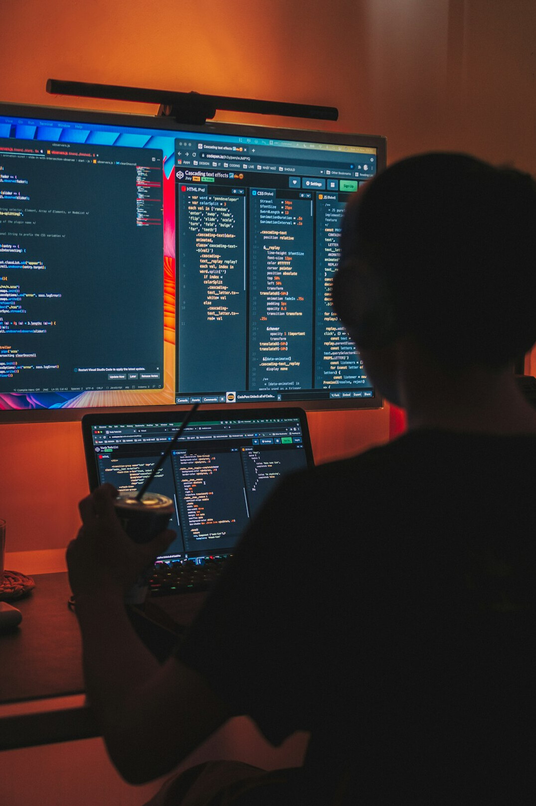 programmer coding at desk