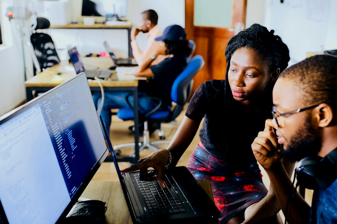 team working on computer software